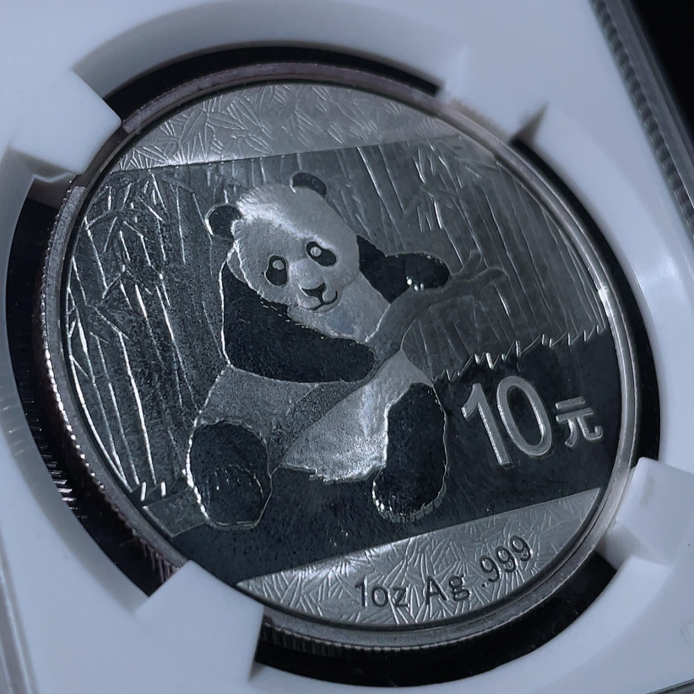 Q33937460 2014 Panda Silver Coin 1oz Pure Silver Face Value 10 Yuan with Slight Oxidation Marks