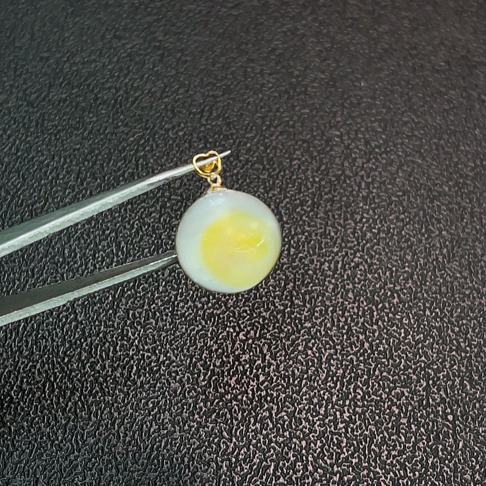 C32816889 18k combined sea water pearl pendant, color origin undetermined, total weight approximately 1.58g