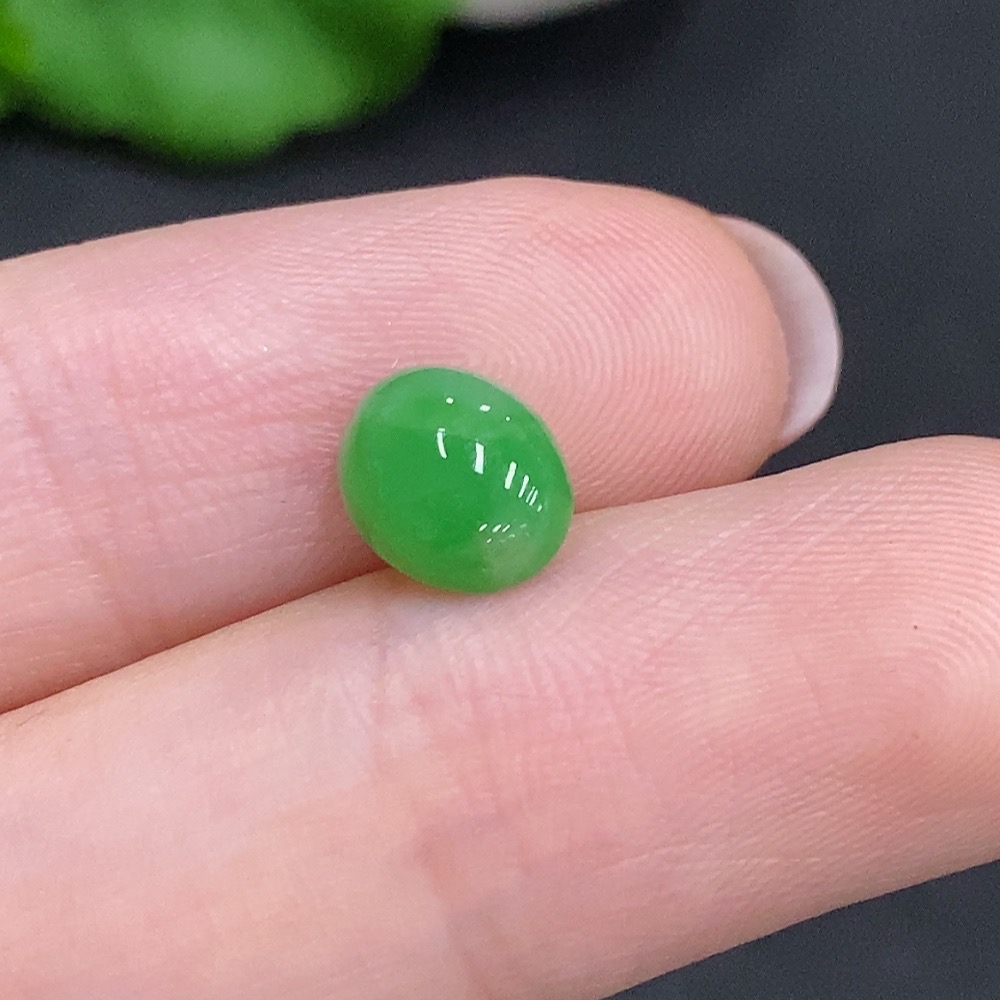 F34969171 Jadeite cabochon, total weight approximately 0.3g