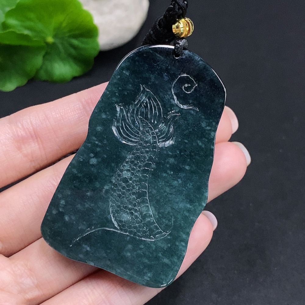 F34060635 Jadeite Dragon Soaring Across the Seas Pendant