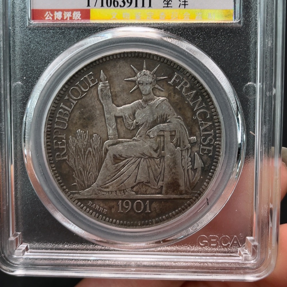 Q24716042 GBCR seated Liberty silver dollar
