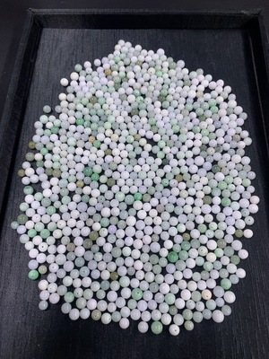 F46549027 翡翠珠子 一手走60+ 颜色成因未定 含其他矿物成分  货品总重约499.21g含袋