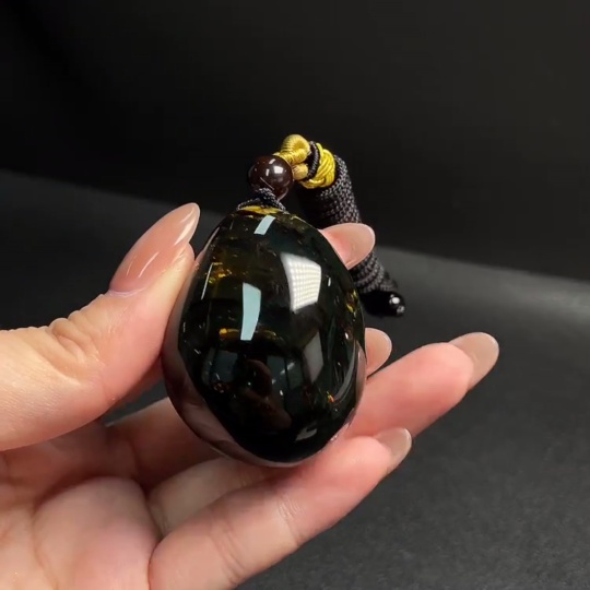 C31619792 Amber and Beeswax Pendant, Total Weight Approx. 27.15g Including Rope