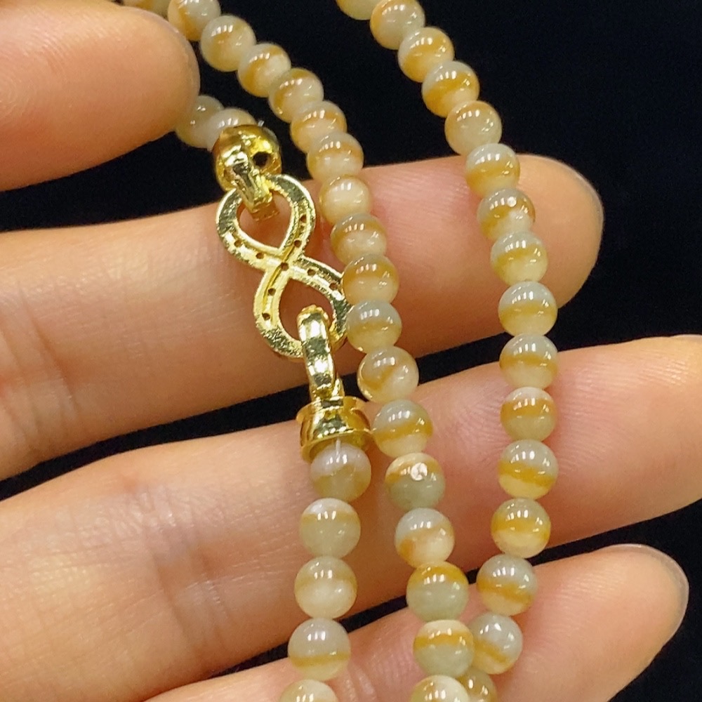 F34024094 Jadeite bead necklace, approximately 3.6mm in size, total weight about 18.79g, non-gold, yellow part color origin undetermined