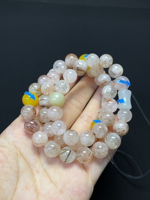 C46535135 水晶珠链 配和田玉 颜色成因未定 可见有机物 配石考虑非天然 货品总重约63.06g 卡9.3mm左右