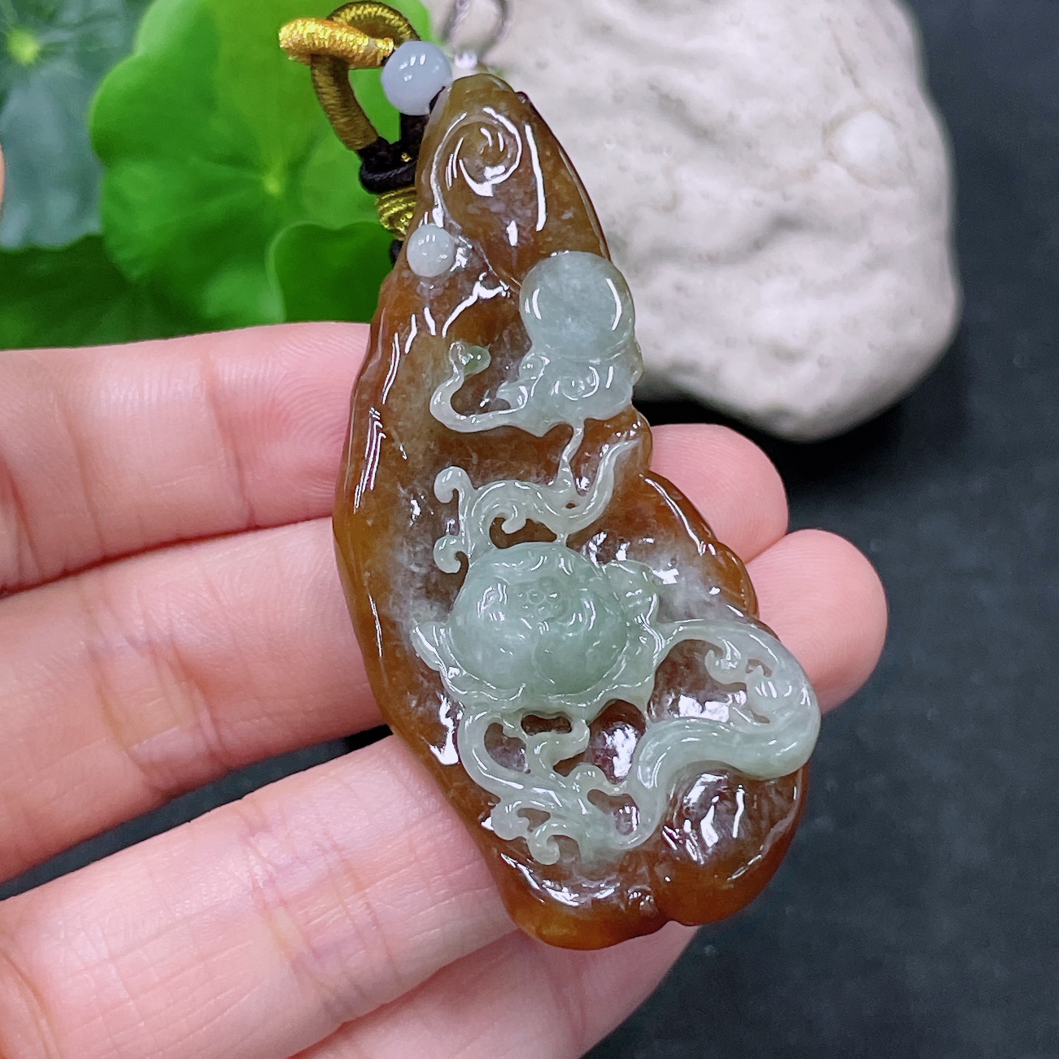 F33838640 Jadeite Pendant, color origin undetermined, total weight including string approx. 25.65g