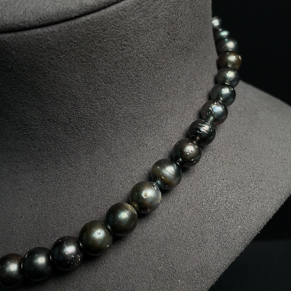 C24824292 Seawater Pearl Strand Non-Gold Setting Size 7.9-11.6mm Approx. Total Weight About 53.31g Color Origin Undetermined
