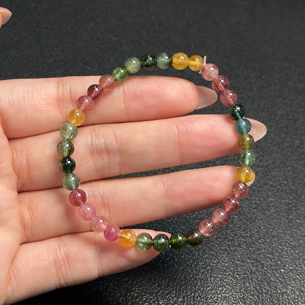 C33870451 Tourmaline bracelet containing other mineral components, visible organic matter, total weight approx. 7.70g, bead size about 5mm