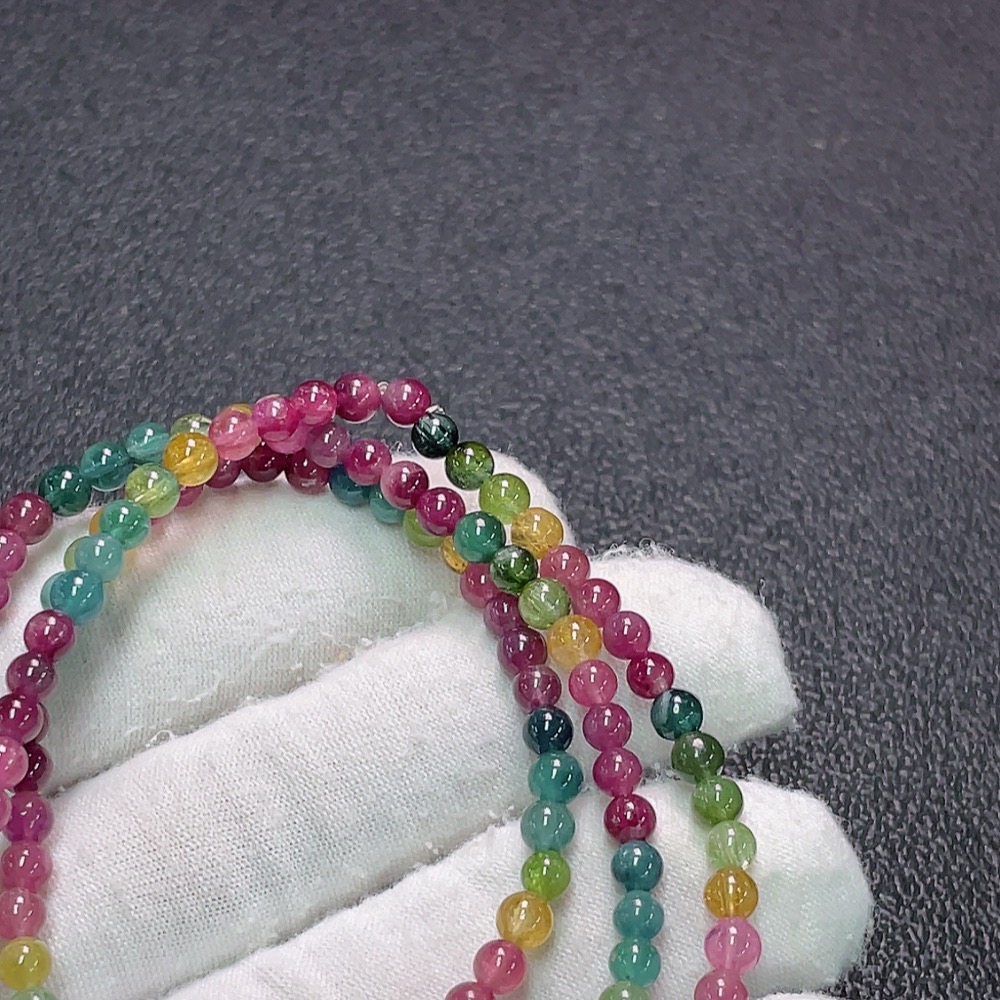 C33922632 Tourmaline bead strand with visible organic matter, total weight approx. 15.48g, bead size approx. 4mm