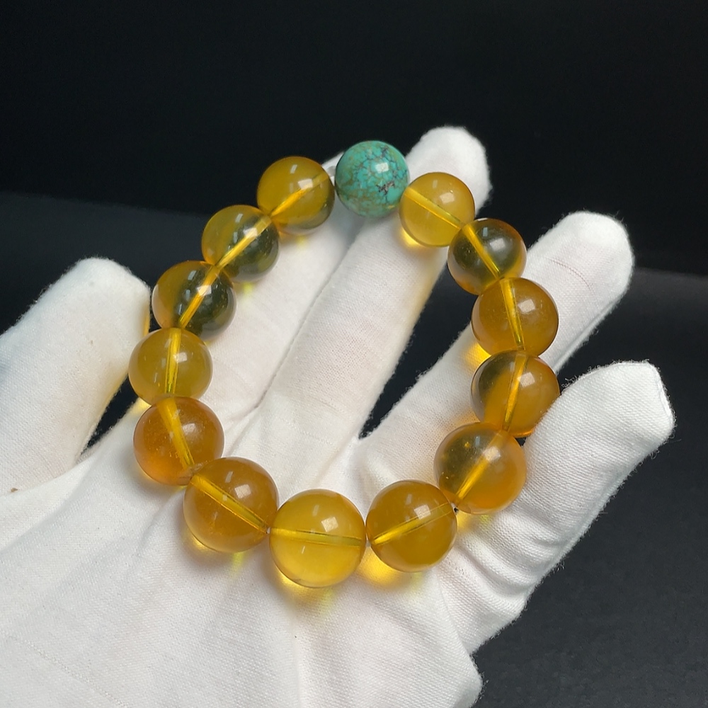 C33921132 Amber Beeswax Bracelet with Turquoise (color origin undetermined) containing other mineral components, total weight approx. 31.69g, size approx. 14.7mm