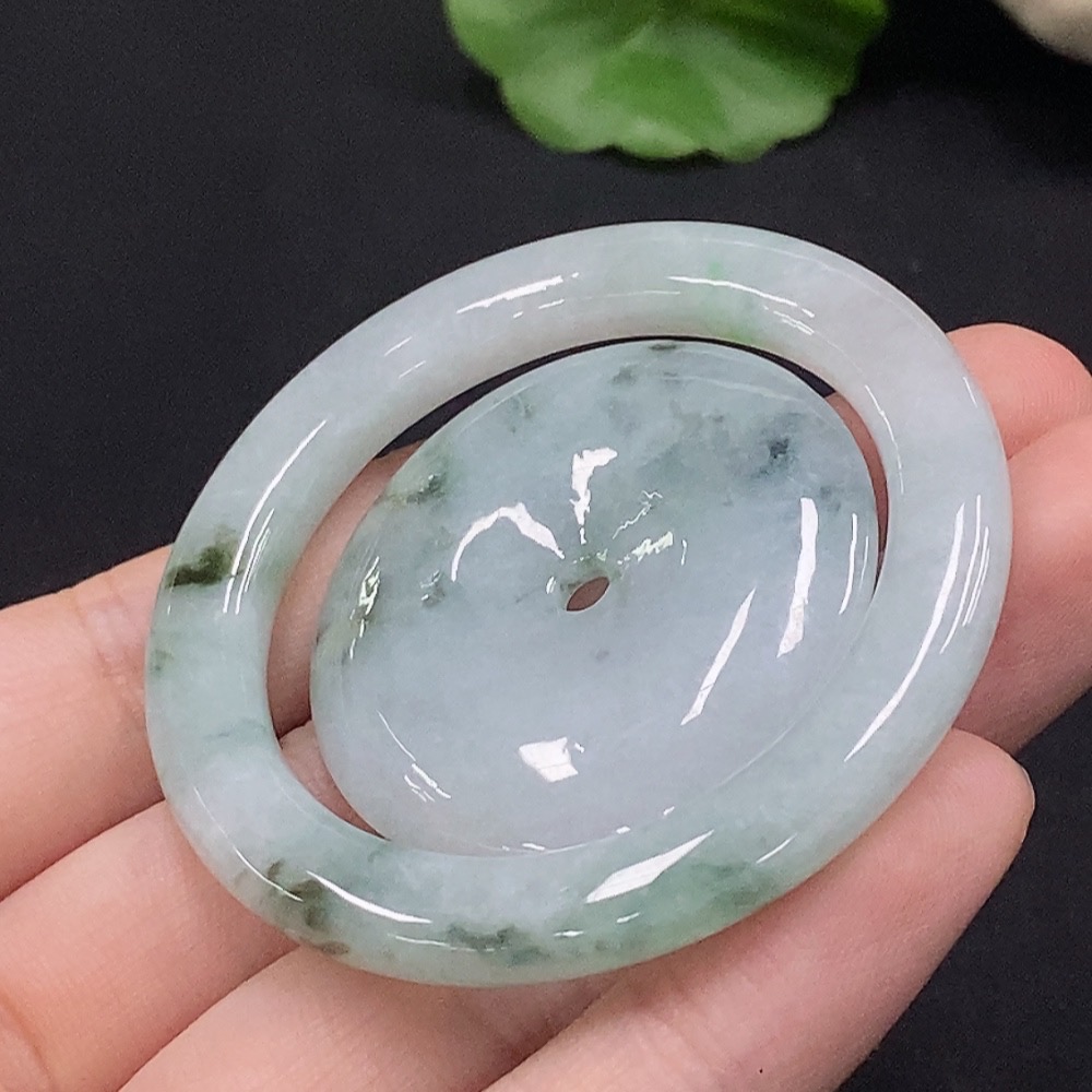 F34028662 Jadeite mother-child button set containing other mineral components