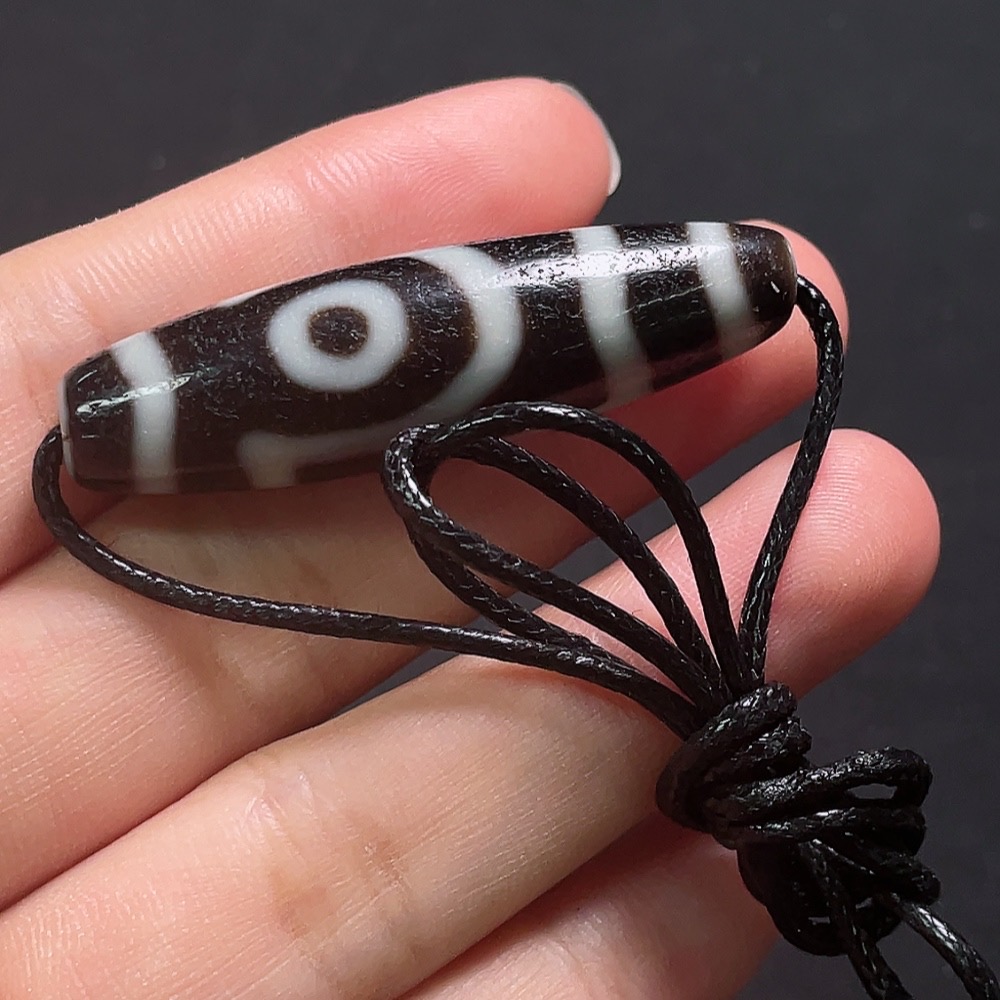 W32764439 Dzi bead pendant, total weight including cord approximately 12.94g, size about 47.2mm