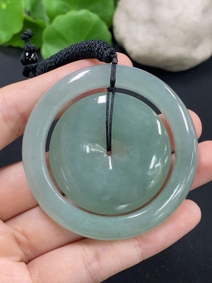 F44297723 翡翠子母扣挂件 货品总重约42.8克（含绳重）（含有色抛光粉）