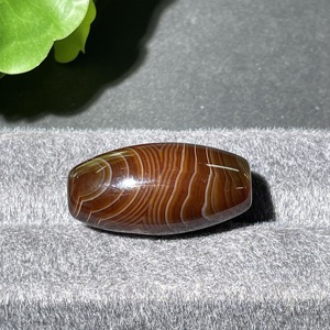 W41931885 约19-20世纪带福眼纹缠丝玛瑙管珠 老珠子