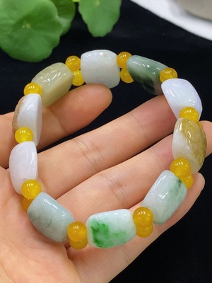 F34947618 Jadeite Bracelet Approx. 20.8mm Total Weight Approx. 62.72g Yellow Color Origin Undetermined Contains Other Mineral Components Non-A Grade Beads