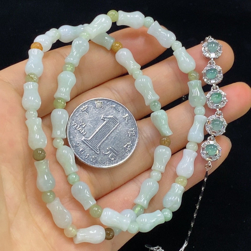 F34948624 Jadeite bracelet non-gold yellow color origin undetermined