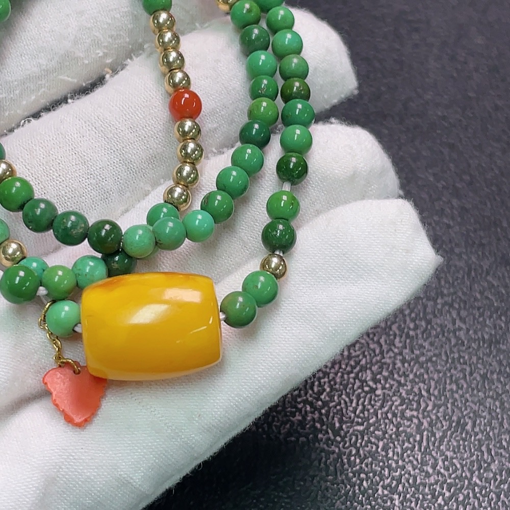 C33922751 Turquoise bead strand with amber and southern red agate, color origin undetermined, containing other mineral components, non-gold, total weight approximately 17.37g, bead size about 4.4mm