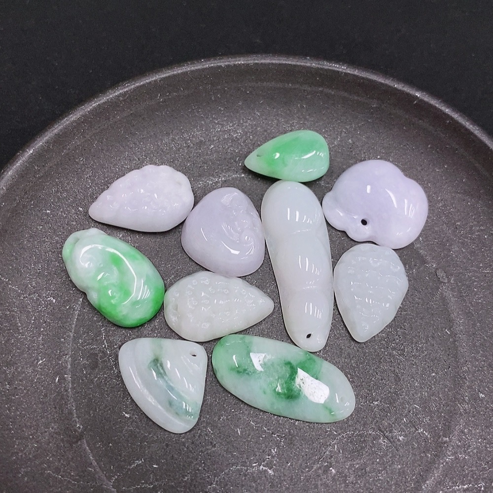 F33877446 Jadeite Pendants Sell as a Lot