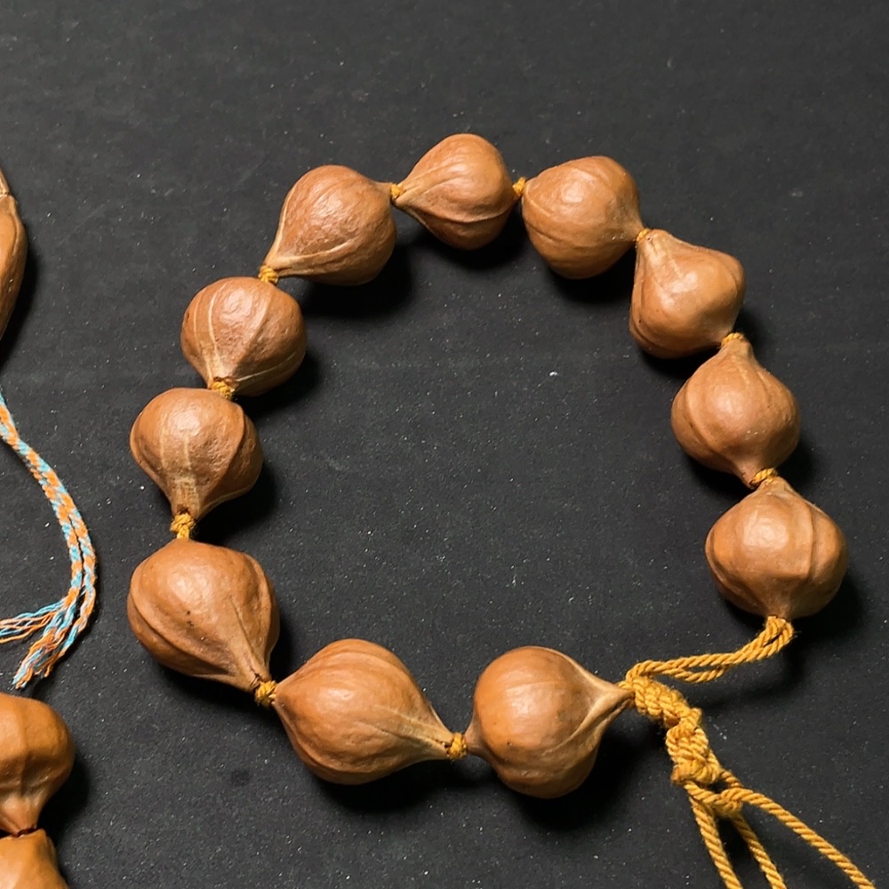 W33842770 Olive pit long bracelet + wrist bracelet, sold as a set
