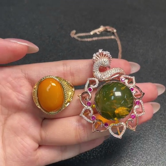 C34993222 Amber Beeswax Pendant + Ring Adjustable Non-Gold Total Weight Approx. 30.75g Sell as a Lot