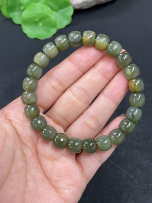 H46488402 和田玉手串    卡8.7mm左右     货品总重约27.2g   皮色成因未定