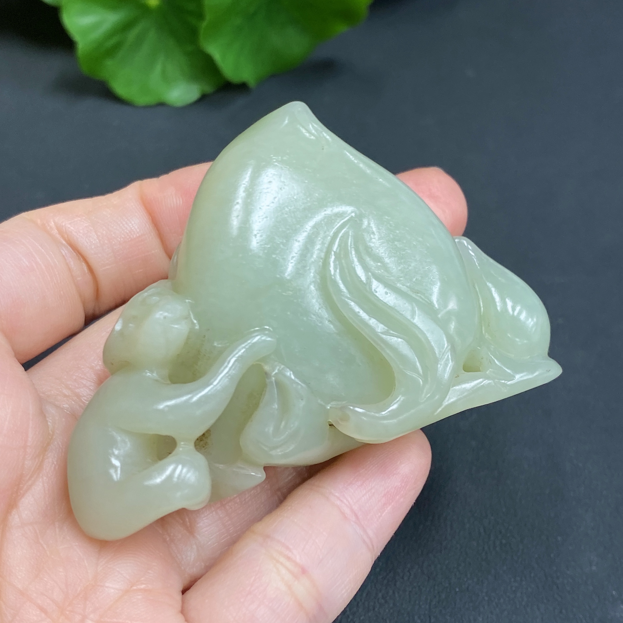 H17865316 Hetian Jade Handheld Carving - Monkey Offering Longevity