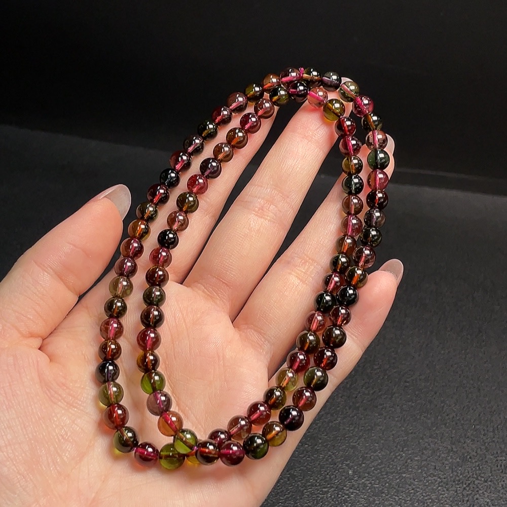 C30511386 Tourmaline Bead Strand Approximately 5.8mm Total Weight About 33.26g Containing Other Mineral Components Visible Organic Matter
