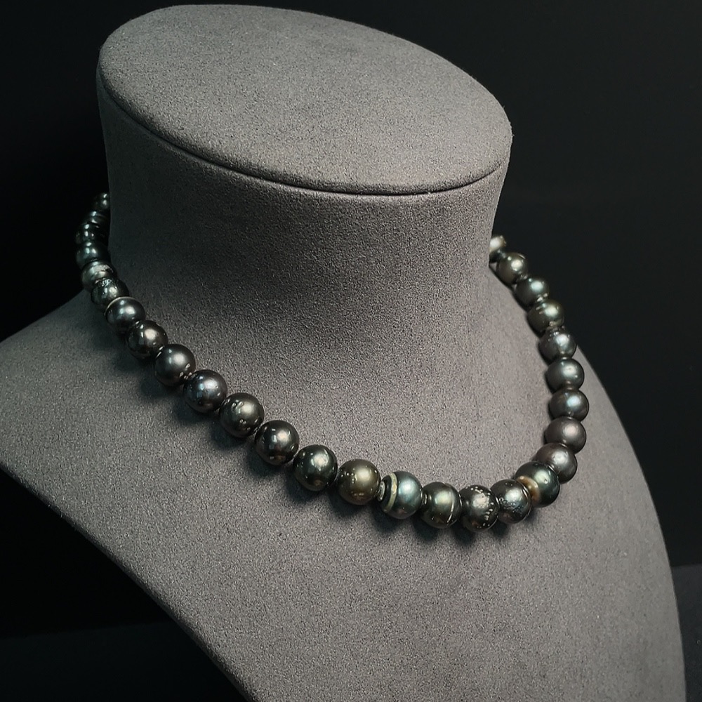 C24824292 Seawater Pearl Strand Non-Gold Setting Size 7.9-11.6mm Approx. Total Weight About 53.31g Color Origin Undetermined