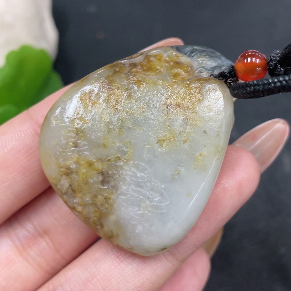 H31672182 Hetian Jade Seed Material Pendant - Abundance Every Year, Contains Other Mineral Components, Undetermined Skin Color Origin, Total Weight (Including Rope) Approx. 28.6g