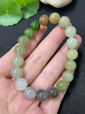 H46576369 和田玉手串  卡9.7mm左右   货品总重约27.4g 杂石