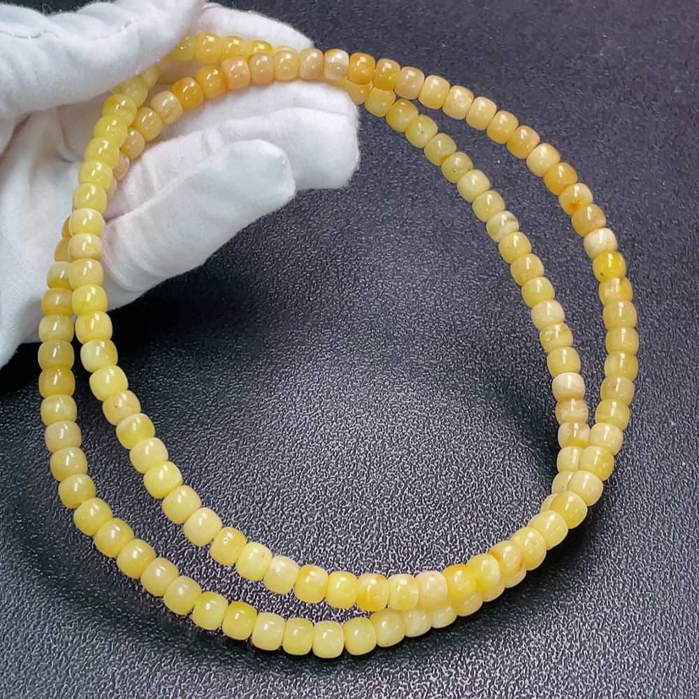 C32816658 Amber Beeswax Bead Strand, Total Weight Approx. 28.52g, Size Approx. 7.1mm