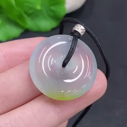 F33908119 Jadeite Peace Knot, total weight including cord approximately 10.3g
