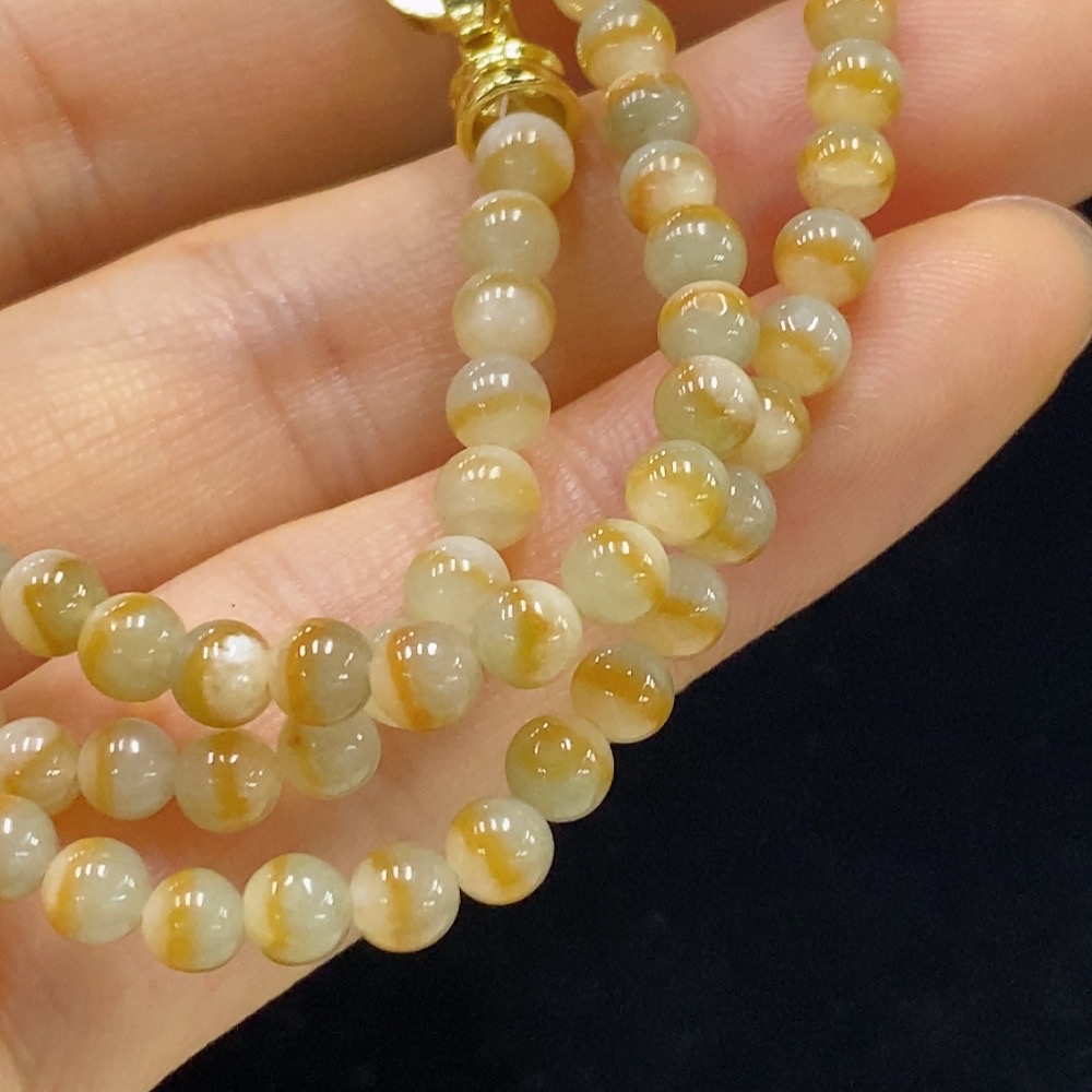 F34024094 Jadeite bead necklace, approximately 3.6mm in size, total weight about 18.79g, non-gold, yellow part color origin undetermined
