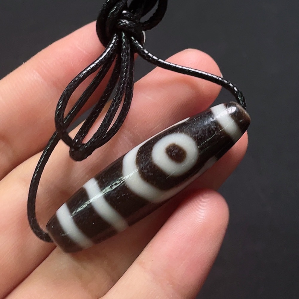 W32764439 Dzi bead pendant, total weight including cord approximately 12.94g, size about 47.2mm