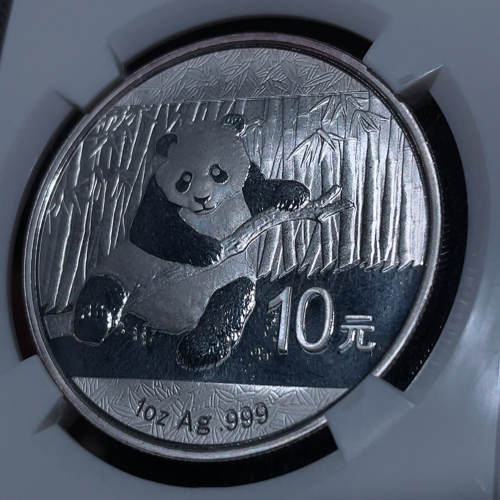 Q33937460 2014 Panda Silver Coin 1oz Pure Silver Face Value 10 Yuan with Slight Oxidation Marks