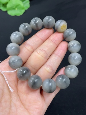 H43124558 和田玉手串     卡13.8mm左右     货品总重约62.4g    皮色成因未定