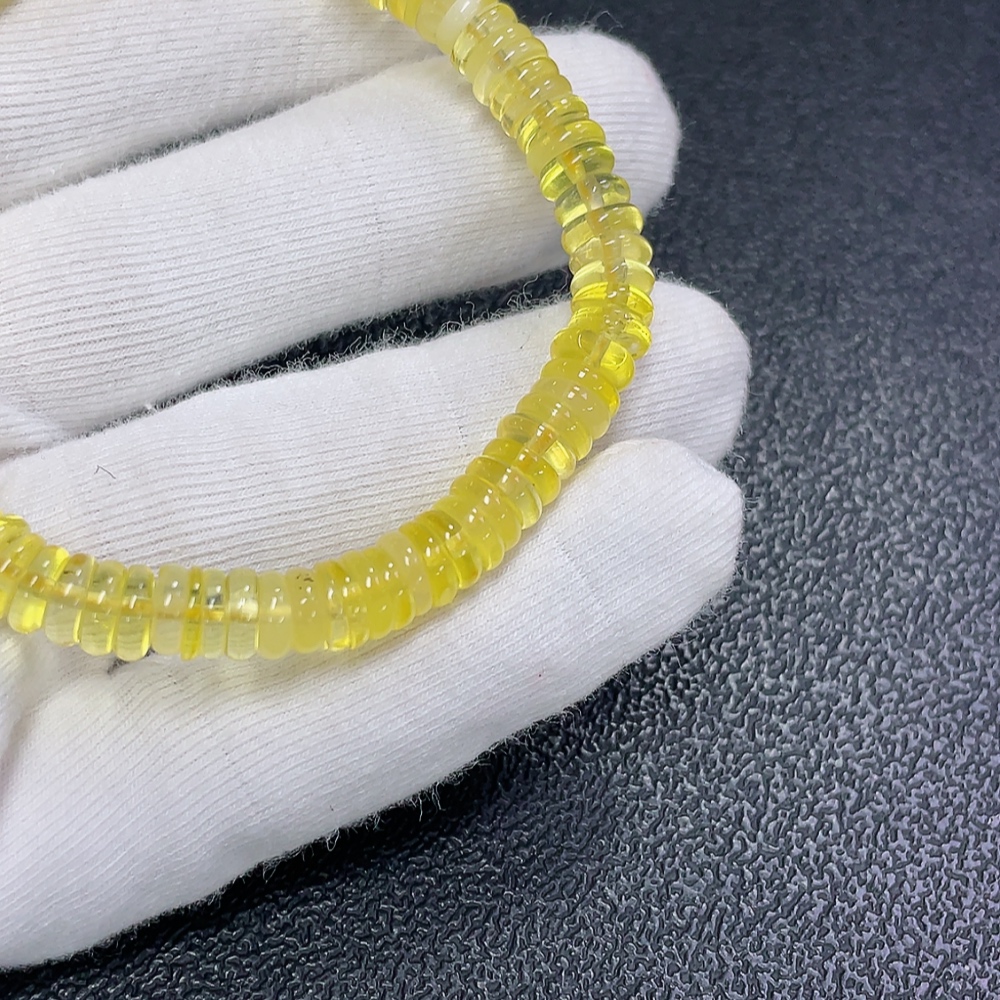 C31577970 Amber Beeswax Bracelet, total weight approx. 6.46g, bead size approx. 6.7mm