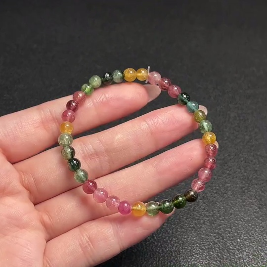 C33870451 Tourmaline bracelet containing other mineral components, visible organic matter, total weight approx. 7.70g, bead size about 5mm