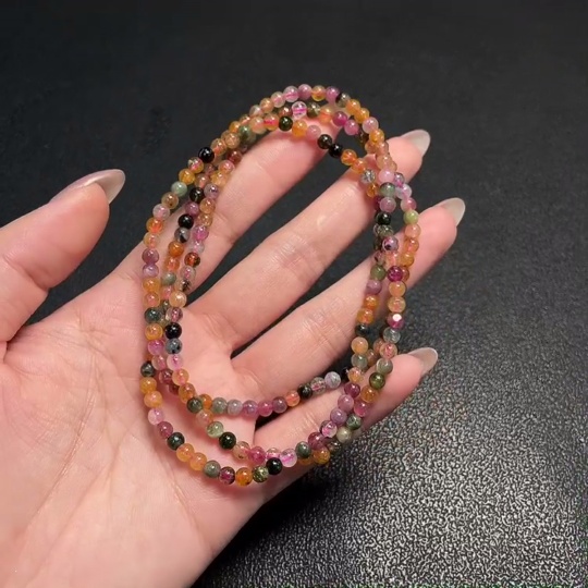 C34008843 Tourmaline bead strand with other mineral components, visible organic matter, total weight approx. 17.98g, size approx. 3.9mm