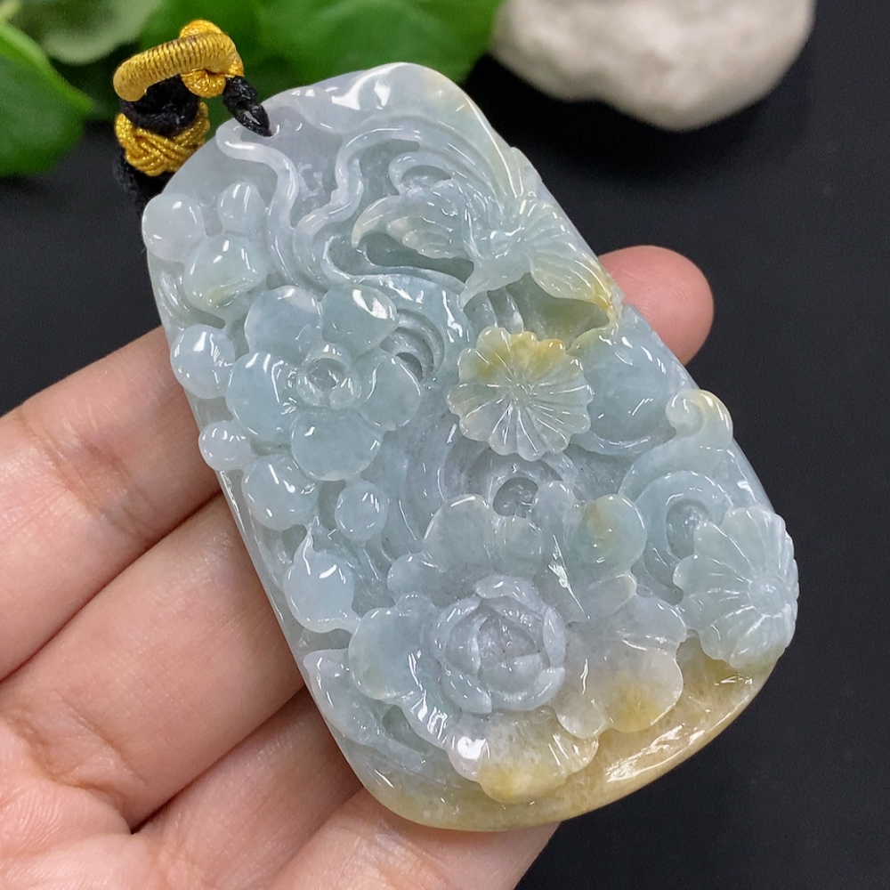 F35163715 Jadeite Flower of Prosperity Pendant with a total weight of approximately 58 grams including the cord