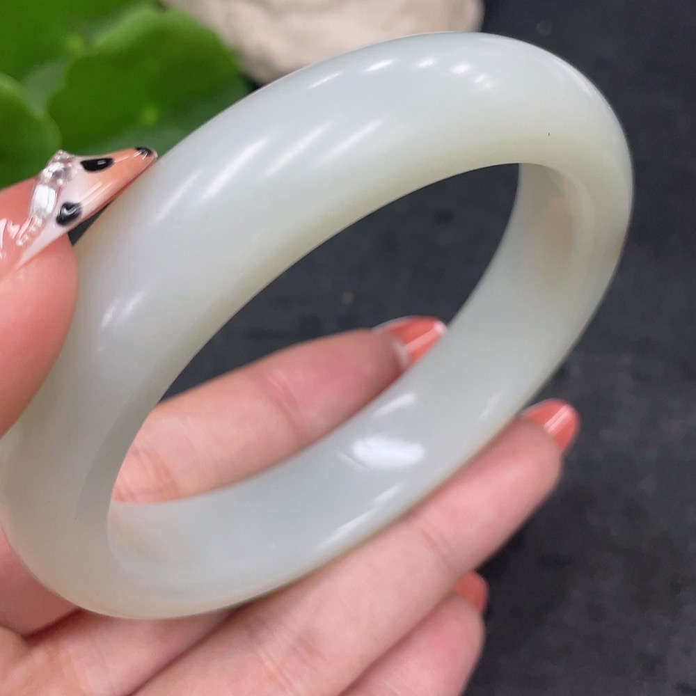 H34979385 Hetian Jade Round Bracelet Size 59.7 Total Weight Approx. 64.8g Color Origin Undetermined Contains Other Mineral Components