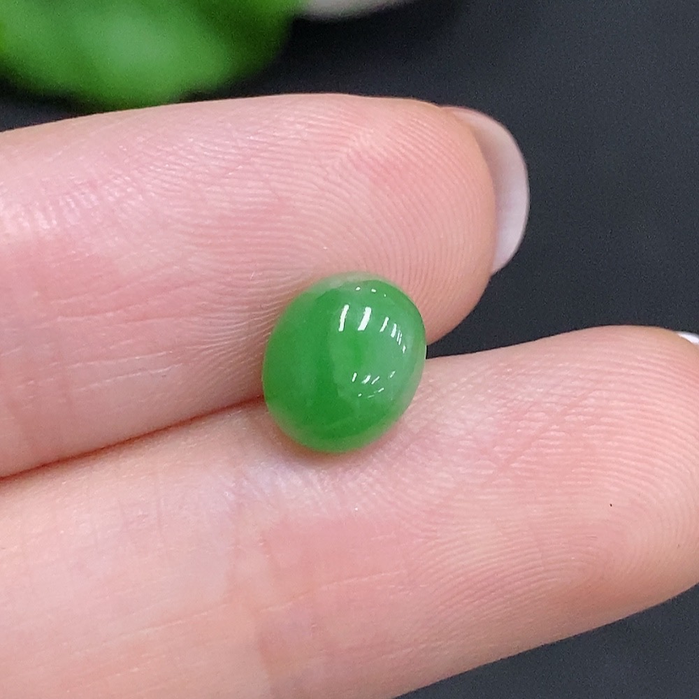 F34969171 Jadeite cabochon, total weight approximately 0.3g