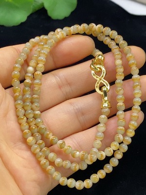 F34024094 Jadeite bead necklace, approximately 3.6mm in size, total weight about 18.79g, non-gold, yellow part color origin undetermined