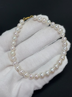 C46539076 珍珠手串 无印记测金含量18K 串绳非金  货品总重约9.0克 卡5.8mm左右