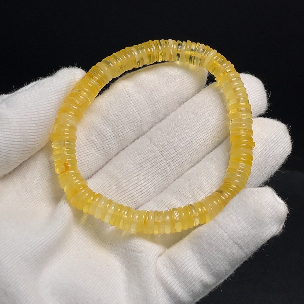 C30469492 Amber Beeswax Bracelet, about 7.4mm, total weight about 7.35g