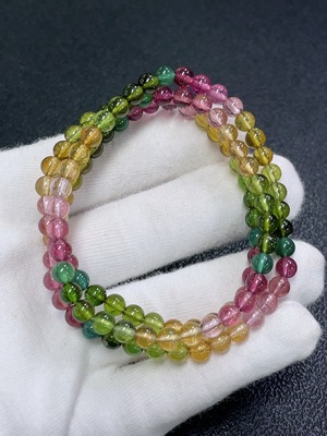 C30568353 Tourmaline Bead Strand Approx. 5.1mm Total Weight About 22.04g Visible Organic Matter Contains Other Mineral Components