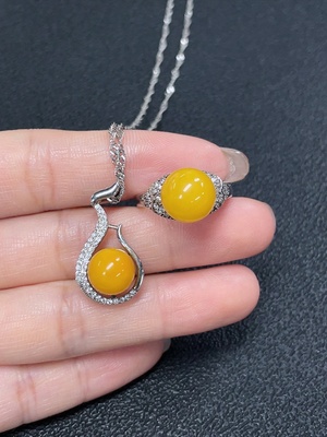 C29368481 Amber Beeswax Pendant + Ring Adjustable Non-Gold Total Weight Approx. 7.72g Sell as a Lot