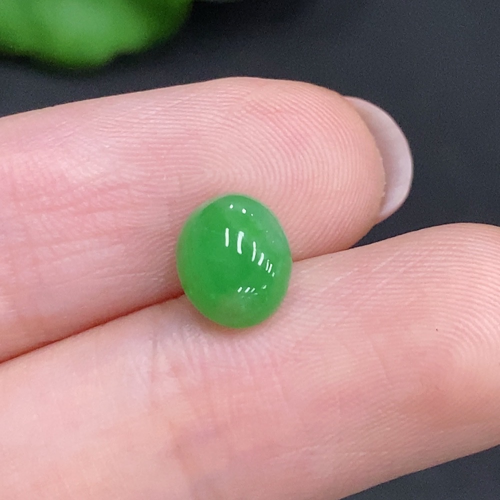 F34969171 Jadeite cabochon, total weight approximately 0.3g