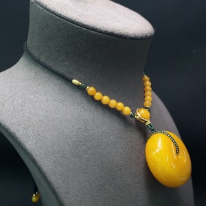 C28312062 Amber Beeswax Pendant with Hetian Jade, Total Weight Including Rope Approximately 34.68g, Non-Gold-Inlaid
