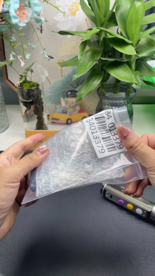 F34013379 Jadeite Landscape Pendant with a total weight of approximately 69.3 grams (including rope weight)